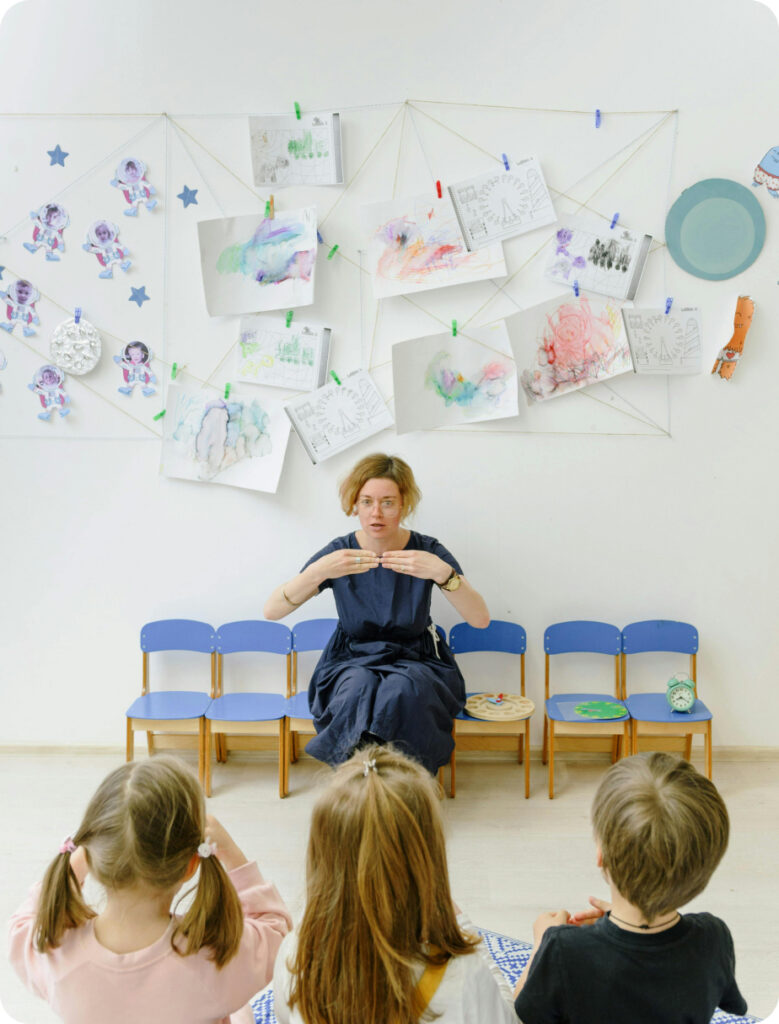 Teacher with young children